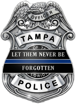 Tampa Police memorial badge with mourning band reading Let Them Never Be Forgotten